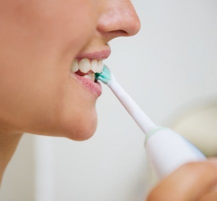 Brushing with Electric Toothbrush